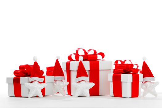 Gift boxes with santa claus stars isolated on white background