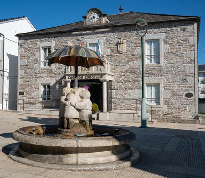 Historic townhall of Castroverde with children water well, Camino de Santiago trail, Calicia, Spain
