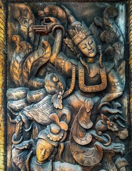 Closeup Wood carving Thai People in Literature