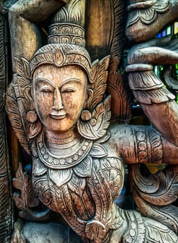 Closeup Wood carving Thai People in Literature