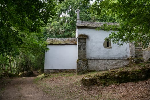 Old chapel San Lazaro in the forest of Padraira, Camino de Santiago close to Grandas de Salime, Asturias, Spain
