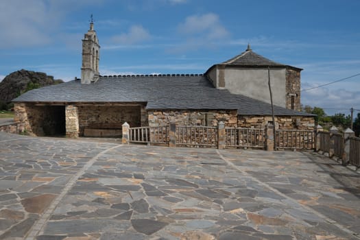 Old church Santa Maria Magdalena in sunlight with blue sky, Penafonte, Camino de Santiago close to Grandas de Salime, Asturias, Spain