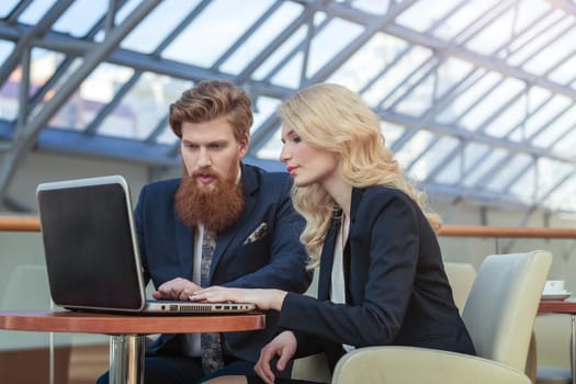 business couple working together on project at modern office