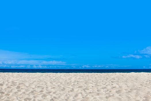 Empty sea and sandy beach background with copy space
