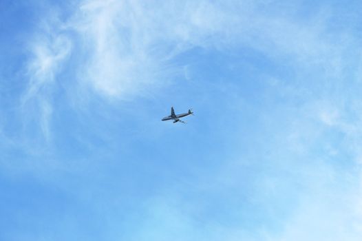 Plane flying in blue sky, travel concept, Empty copy space