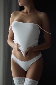 Girl with big Breasts in white lingerie