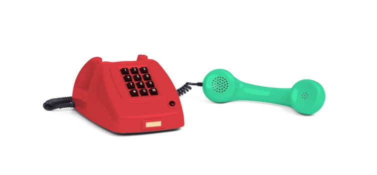 Vintage multi colored telephone with a white background