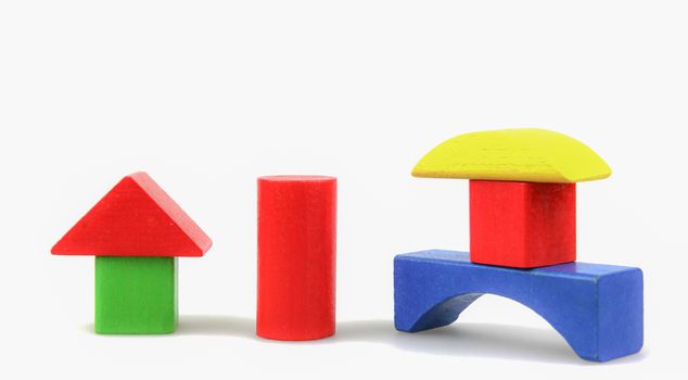 Colorful Wooden Building Blocks Toys Isolated On White