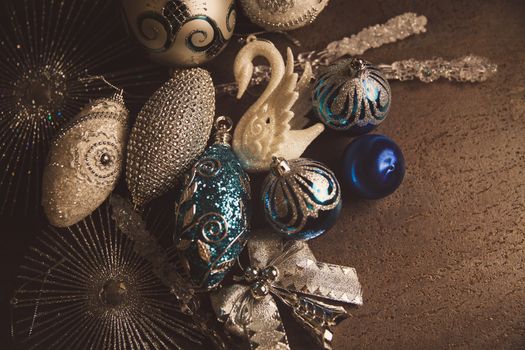 Beautiful silver and blue christmas balls for 2019 New Year on a dark background. Copy space