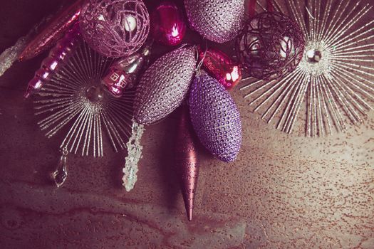 vintage christmas 2019 background with colorful toys on dark surface