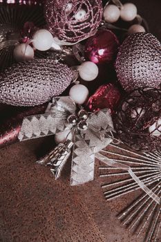 vintage christmas 2019 background with colorful toys on dark surface