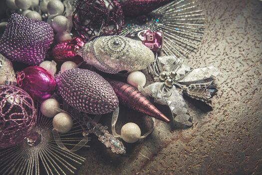 vintage christmas 2019 background with colorful toys on dark surface