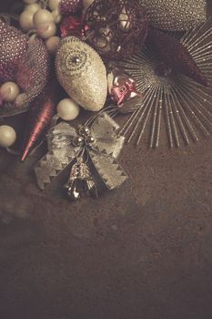 vintage christmas 2019 background with colorful toys on dark surface