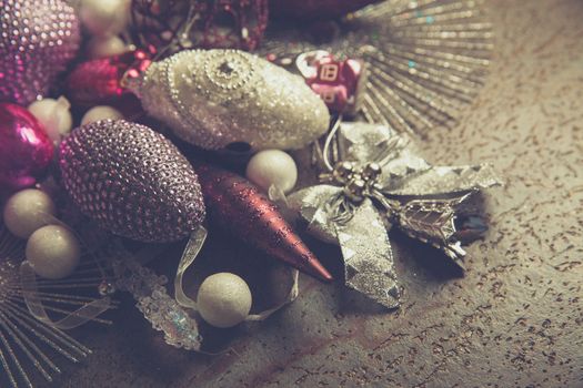 vintage christmas 2019 background with colorful toys on dark surface