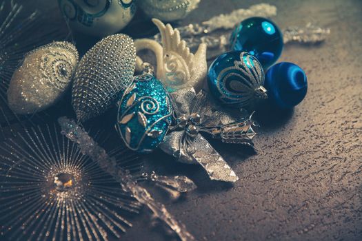 Beautiful silver and blue christmas balls for 2019 New Year on a dark background. Copy space