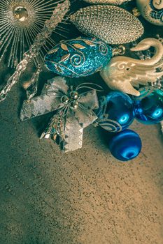 Beautiful silver and blue christmas balls for 2019 New Year on a dark background. Copy space