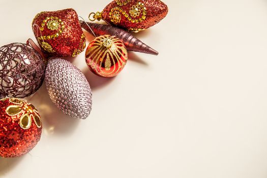 Top view of christmas decor set in red,crimson,pink and lilac colors