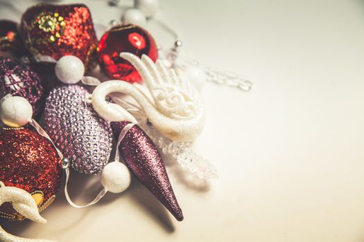 Top view of christmas decor set in red,crimson,pink and lilac colors