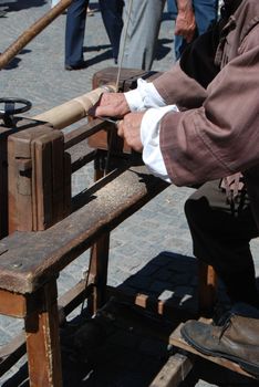 Turner works at one leg of a table