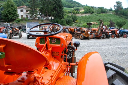 Old tractors at an exhibition in Langhe, Piedmont - Italy