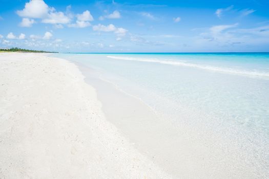 Awesome beach of Varadero during a sunny day, fine white sand and turquoise and blue Caribbean sea,sky with clouds,Cuba.