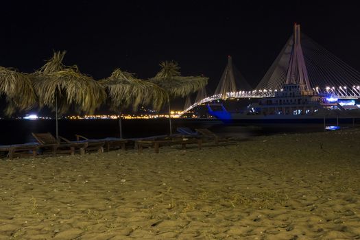 View of Rio-Antirio bridge at night, Greece. The Rio Antirrio Bridge is one of the world's longest multi-span cable-stayed bridges.