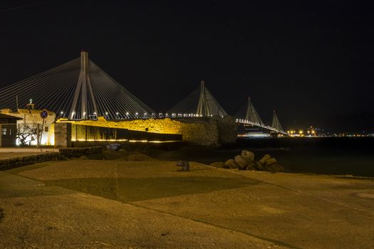 View of Rio-Antirio bridge at night, Greece. The Rio Antirrio Bridge is one of the world's longest multi-span cable-stayed bridges.