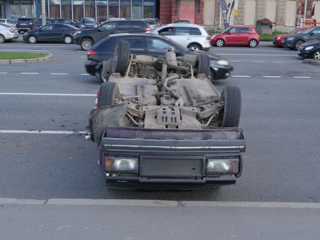 Accident, overturned car on the carriageway