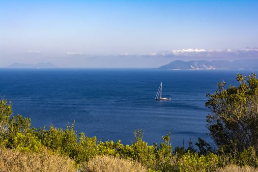 Sailboat in the sea. Summer season nature background.