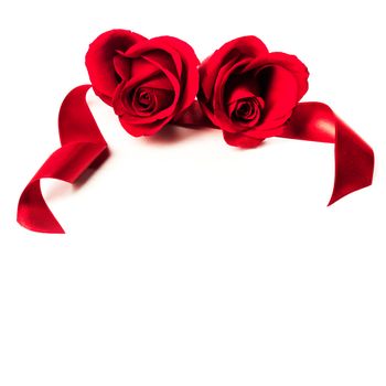 Two heart shaped red roses and ribbons isolated on white background, Valentines day