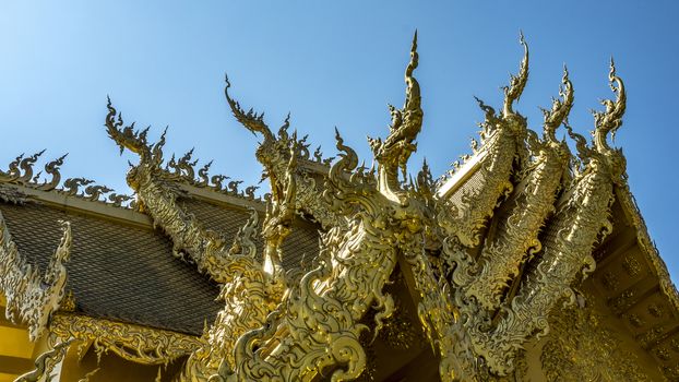 the eaves of bridge in Wat Rong Khun (white temple) of Chiang Mai, Thailand.