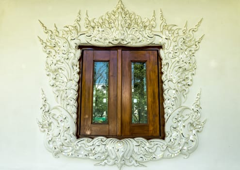 the window of  Wat Rong Khun (white temple) of Chiang Mai, Thailand.