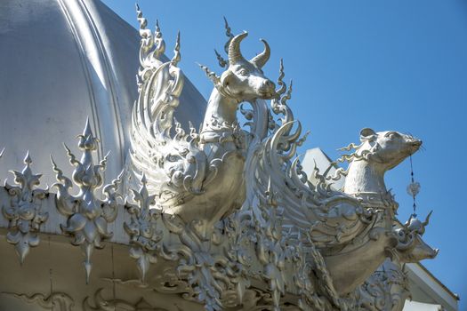 the eaves of Wat Rong Khun (white temple) of Chiang Mai, Thailand.