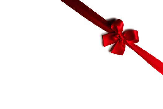 Red gift bow isolated on white background