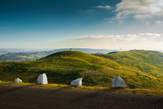 Beautiful landscape with portuguese windmills over the hills