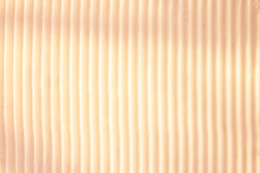 Background of vertical geometrical parallel stripes of snow colored with light shade