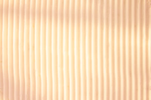 Background of vertical geometrical parallel stripes of snow colored with light shade