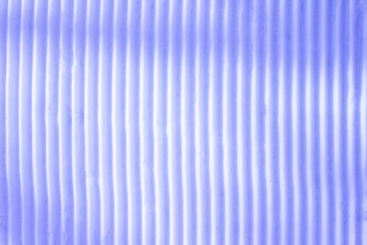 Background of vertical geometrical parallel stripes of snow colored with light shade