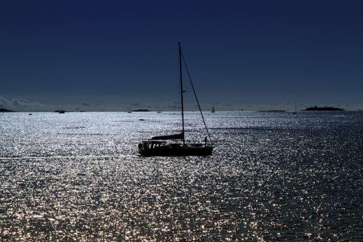 Sailboat on the sea in good weather. Horizon on the background.
