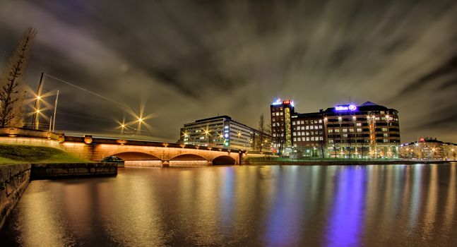 Night photo of Pitkäsilta ( Long Bridge) and hotel Hilton in Hakaniemi, Helsinki. Photo taken in 2017