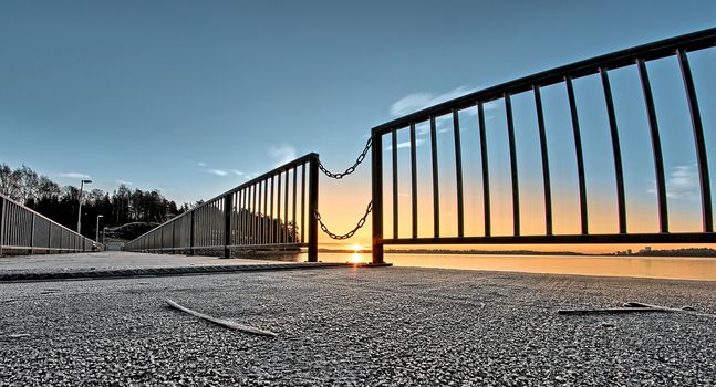 Low angle photo of a sunrise on a cold winter morning.