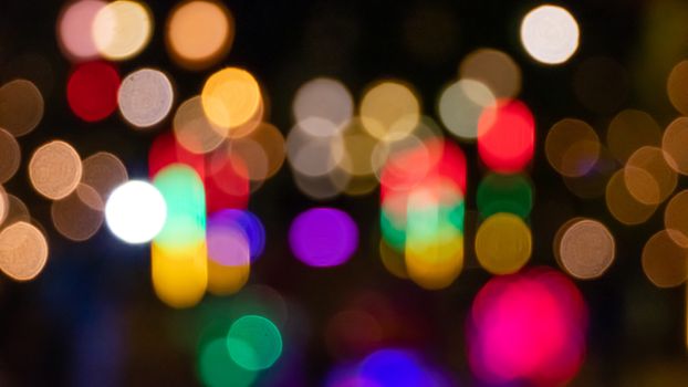 Abstract & Festive background with bokeh defocused lights