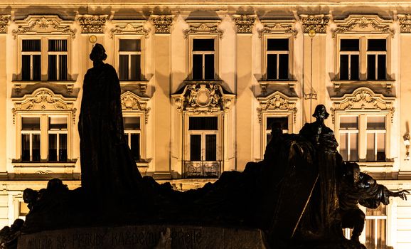 Silhouette of Jan Hus Memorial at Old Town Square by night. Prague, Czech Republic.