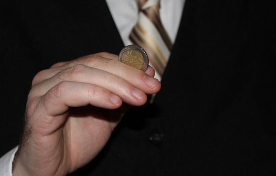 man hand holding a coins, finance concept, counting