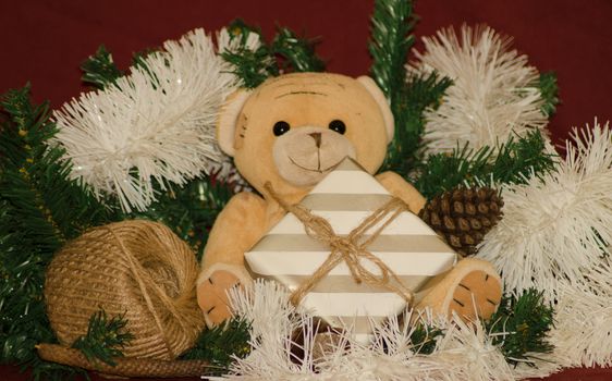 merry christmas postcard design with teddy bear and gift box red