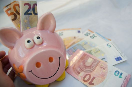 euro currency, background piggy bank walet