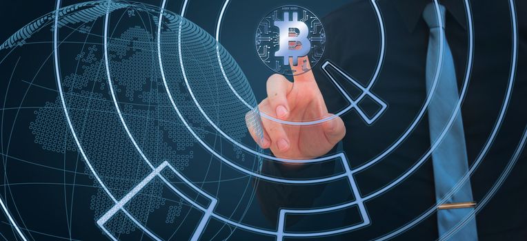 businessman pointing finger on the bitcoin digital cryptocurrency with stock market chart and globe, cryptocurrency concept