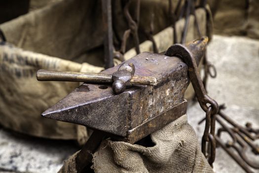 Carbon fire in a forge, detail of a workshop with iron