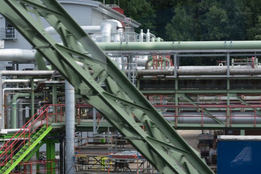 View of pipelines and towers of the oil and gas refinery.