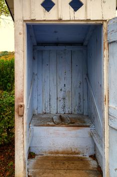 Rural outbuildings. A typical old fashioned WC, outhouse on an old farm